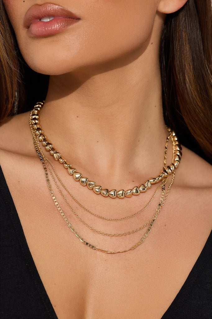 https://cdn.shopify.com/s/files/1/0293/9277/files/02-13-25_S1_56_290312_Gold_TK_MC_11-59-00_33860_PXF.jpg?v=1739574842