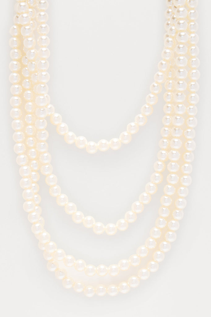 https://cdn.shopify.com/s/files/1/0293/9277/files/04-01-25_S10_26_KCN72169Q_Ivory_CXB_10-06-29_FLATLAY_9735_PXF.jpg?v=1745444693