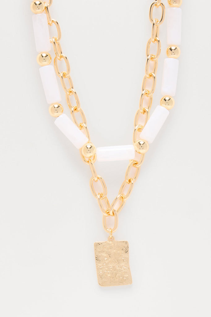 https://cdn.shopify.com/s/files/1/0293/9277/files/04-01-25_S10_7_TNLH84335_Ivorycombo_CXB_09-40-04_FLATLAY_9716_PXF.jpg?v=1745880413