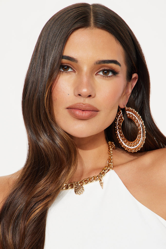 https://cdn.shopify.com/s/files/1/0293/9277/files/04-09-25_S3_65_TSGZ763_Gold_AE_DO_14-00-00_2318_PXF.jpg?v=1744401256