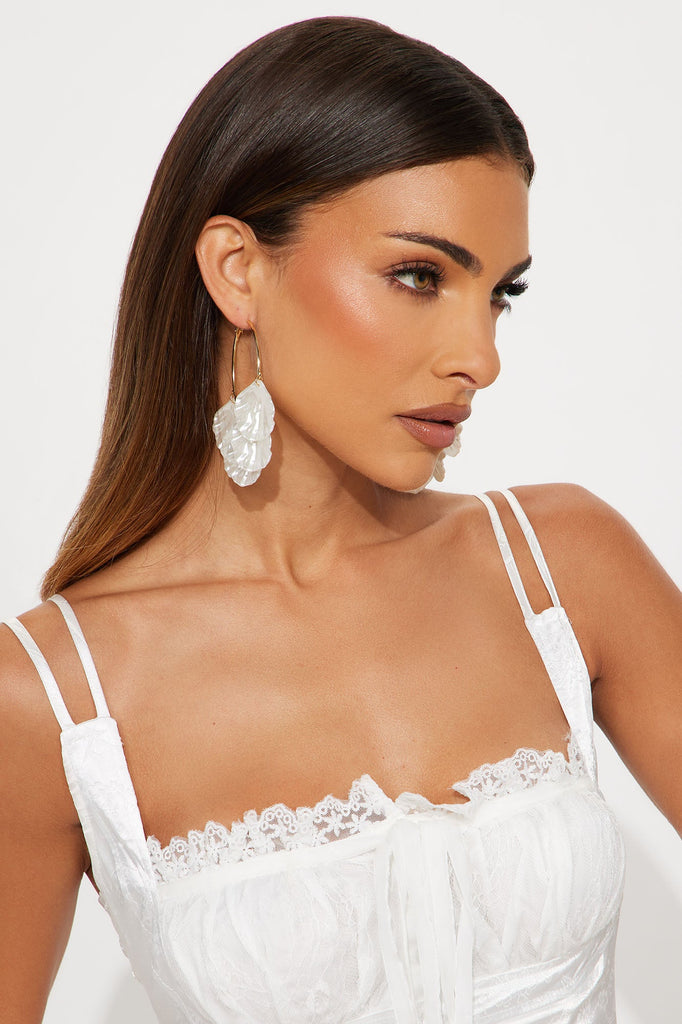 https://cdn.shopify.com/s/files/1/0293/9277/files/05-03-25_S3_31_E9541_Ivorycombo_RM_MC_11-11-51_18141_ES.jpg?v=1746569776
