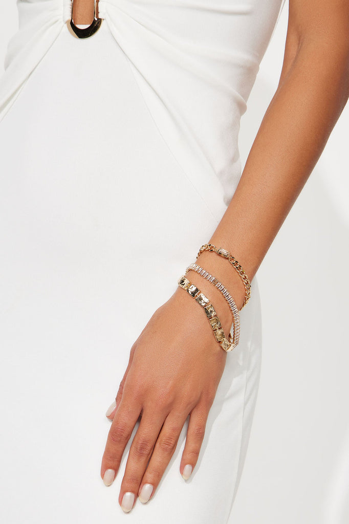 https://cdn.shopify.com/s/files/1/0293/9277/files/05-03-25_S3_81_B2406004_Gold_RM_MC_14-27-45_18800_SG.jpg?v=1746636575