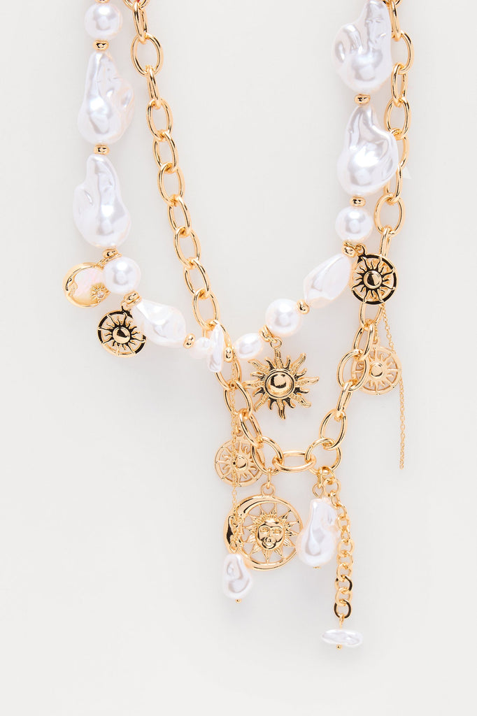 https://cdn.shopify.com/s/files/1/0293/9277/files/05-05-25_S10_25_ZDQZW0902124_Goldcombo_CXB_10-36-05_FLATLAY_11094_PXF.jpg?v=1746818405