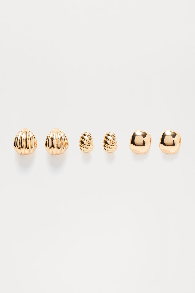 https://cdn.shopify.com/s/files/1/0293/9277/files/06-03-24_S10_21_TLE31585_Gold_CXB_10-42-33_0138_SG_ES.jpg?v=1717632645