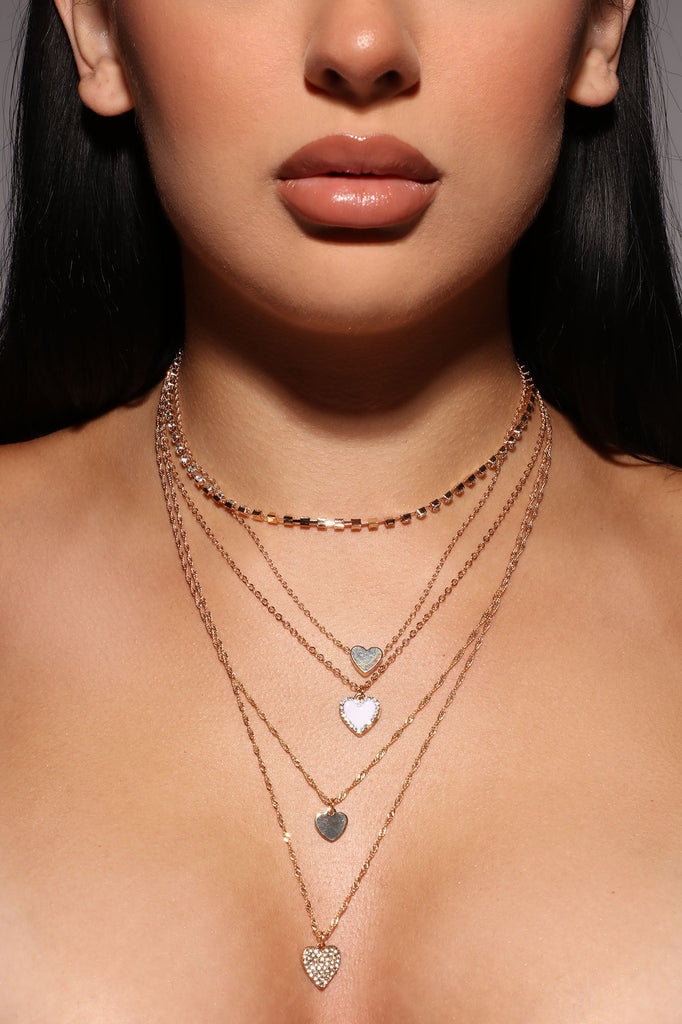 https://cdn.shopify.com/s/files/1/0293/9277/products/06-16-22Studio6_SN_11-35-38_32_TROY10264_Gold_1592__EH.jpg?v=1655748600