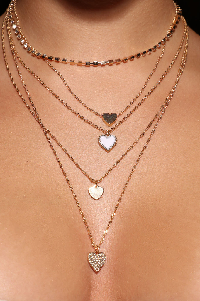 https://cdn.shopify.com/s/files/1/0293/9277/products/06-16-22Studio6_SN_11-35-56_32_TROY10264_Gold_1594__EH.jpg?v=1655748599
