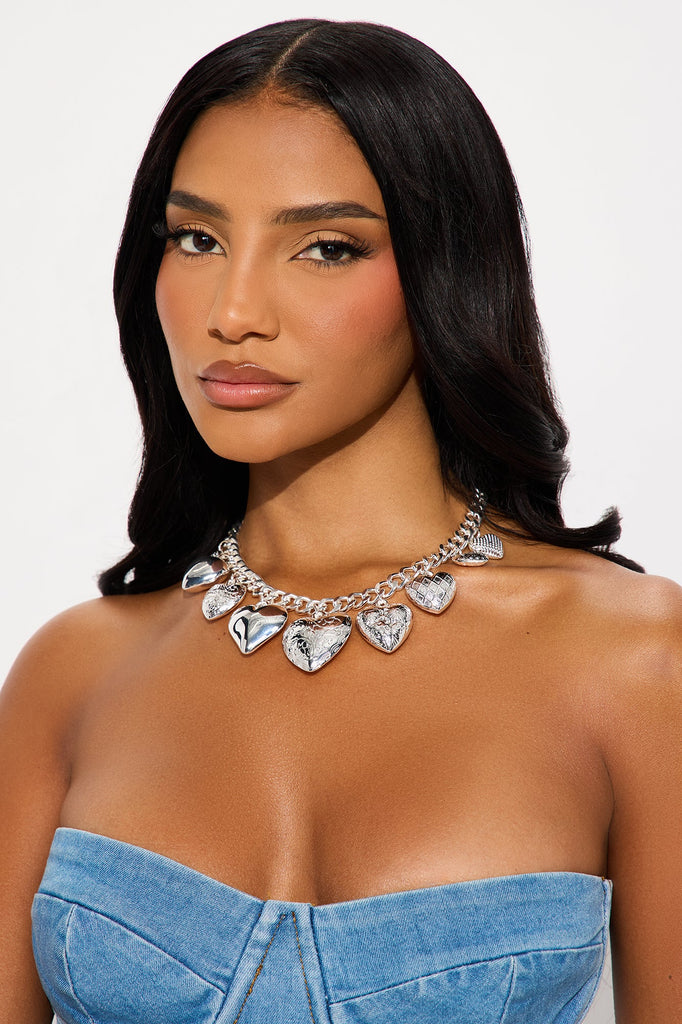 https://cdn.shopify.com/s/files/1/0293/9277/files/06-25-25_S8_4_KCN777191_Silver_CZ_AC_10-08-01_0962_PXF.jpg?v=1751048559
