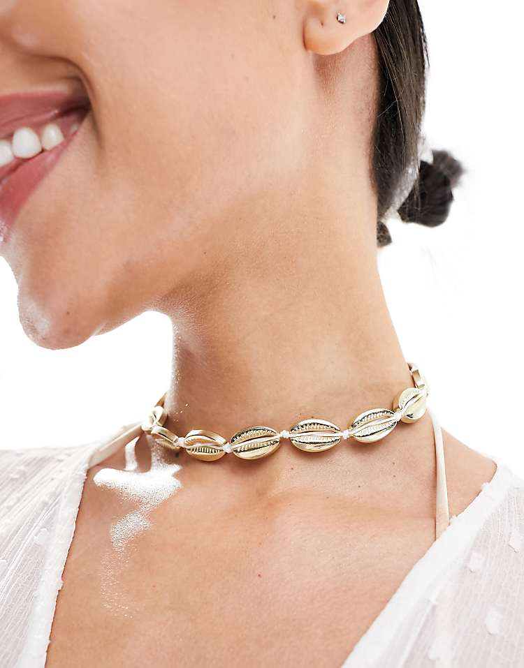 https://images.asos-media.com/products/south-beach-shell-choker-necklace-in-gold/205527636-1-gold?$n_750w$&wid=750&fit=constrain