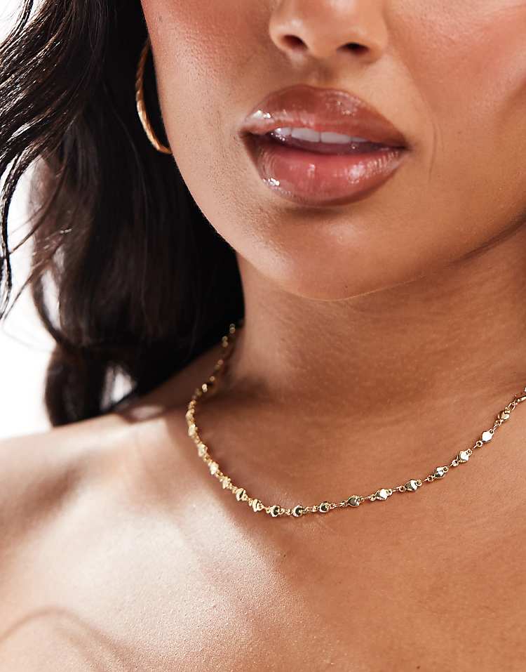 https://images.asos-media.com/products/pieces-curve-string-heart-necklace-in-gold/206813736-4?$n_750w$&wid=750&fit=constrain