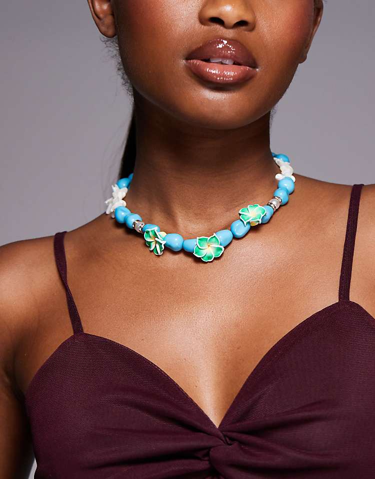 https://images.asos-media.com/products/south-beach-lotus-flower-chunky-beaded-necklace-in-blue/207354977-1-blue?$n_750w$&wid=750&fit=constrain
