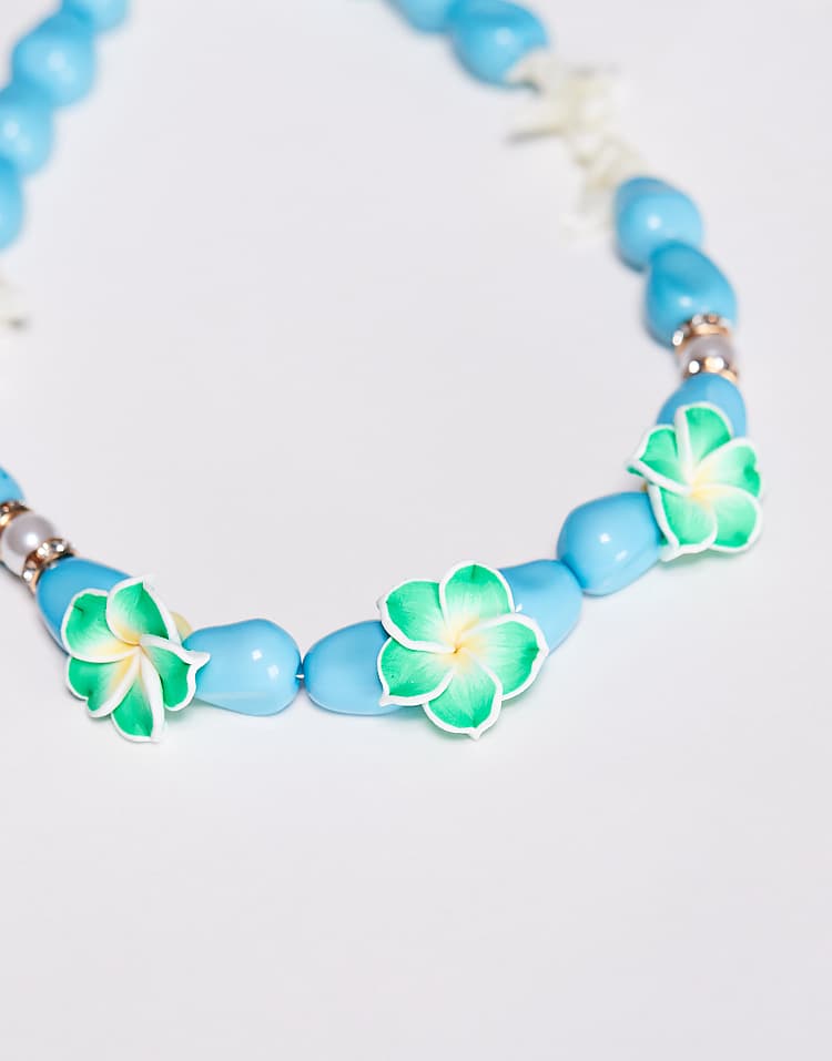 https://images.asos-media.com/products/south-beach-lotus-flower-chunky-beaded-necklace-in-blue/207354977-2?$n_750w$&wid=750&fit=constrain