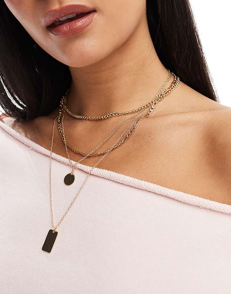 https://images.asos-media.com/products/pieces-multi-chain-necklace-with-charm-detail-in-gold/207423980-1-gold?$n_750w$&wid=750&fit=constrain