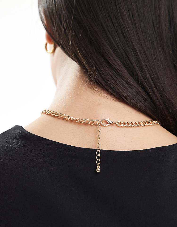 https://images.asos-media.com/products/asos-design-necklace-with-charm-pendant-detail-in-gold-tone/207518647-3?$n_750w$&wid=750&fit=constrain
