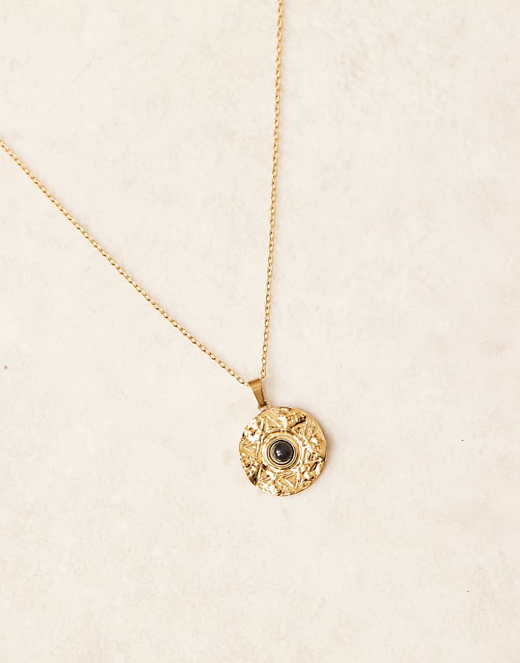 https://images.asos-media.com/products/lost-souls-stainless-steel-18ct-gold-plated-molten-coin-pendant-necklace-with-black-stone/207808865-2?$n_750w$&wid=750&fit=constrain
