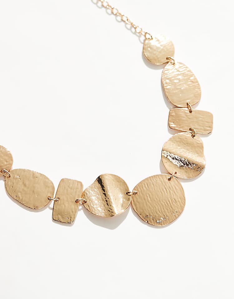 https://images.asos-media.com/products/accessorize-eclectic-shape-statement-necklace-in-gold/207856221-2?$n_750w$&wid=750&fit=constrain