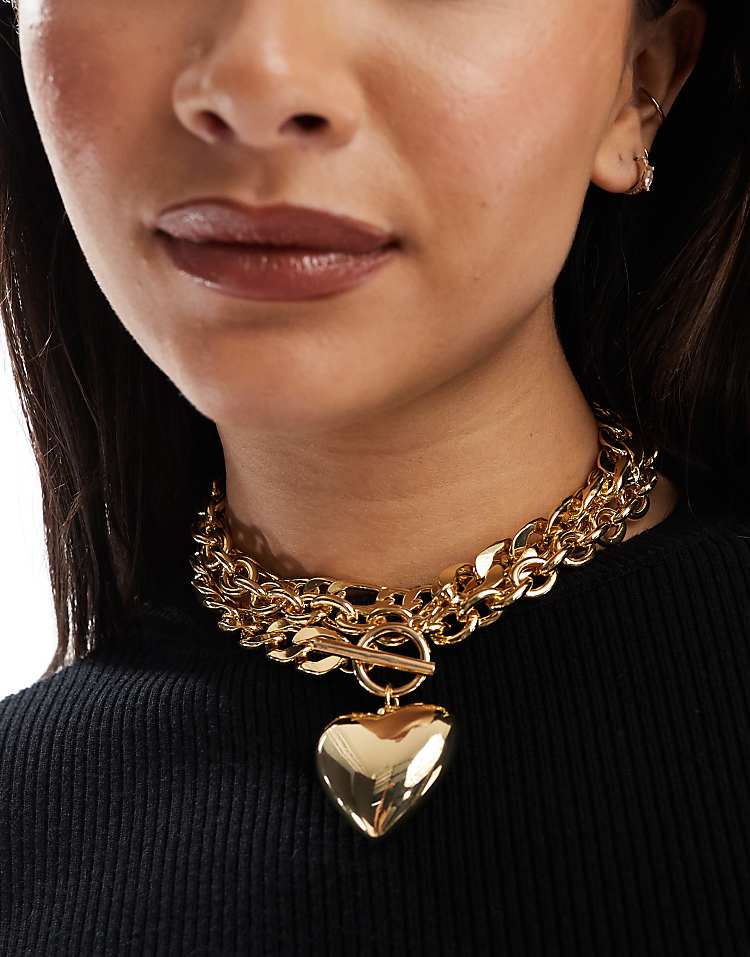 https://images.asos-media.com/products/asos-design-limited-edition-statement-necklace-with-multi-chain-and-puff-heart-detail-in-gold-tone/207925529-1-gold?$n_750w$&wid=750&fit=constrain