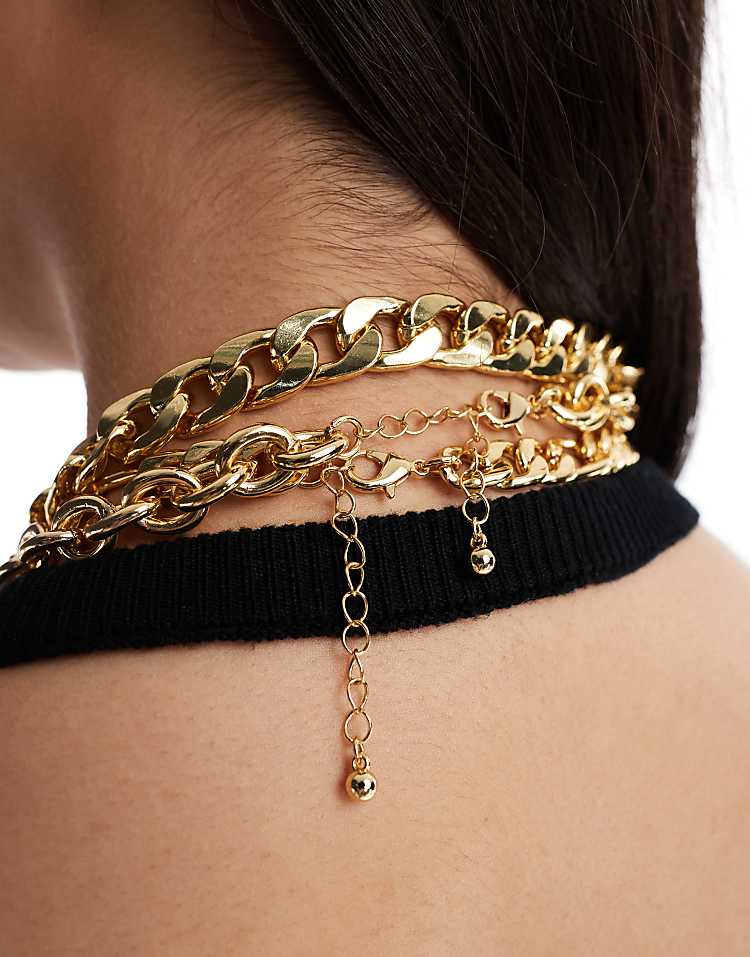 https://images.asos-media.com/products/asos-design-limited-edition-statement-necklace-with-multi-chain-and-puff-heart-detail-in-gold-tone/207925529-3?$n_750w$&wid=750&fit=constrain