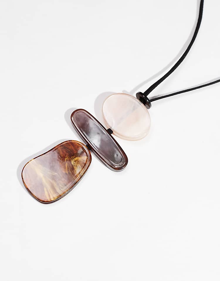 https://images.asos-media.com/products/asos-design-long-pendant-cord-necklace-with-resin-abstract-detail/207925588-2?$n_750w$&wid=750&fit=constrain