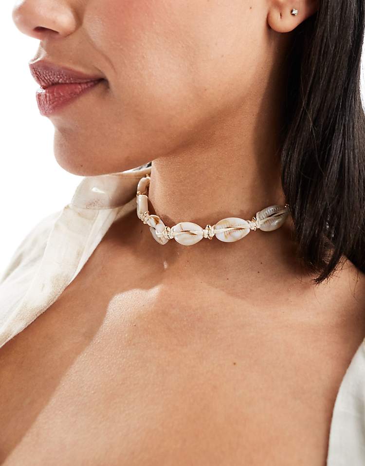 https://images.asos-media.com/products/asos-design-choker-necklace-with-faux-shell-design-in-neutral/208070411-1-stone?$n_750w$&wid=750&fit=constrain