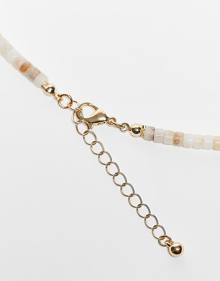 https://images.asos-media.com/products/asos-design-pack-of-2-necklaces-with-bead-and-disc-detail-in-gold-tone/208095177-3?$n_750w$&wid=750&fit=constrain