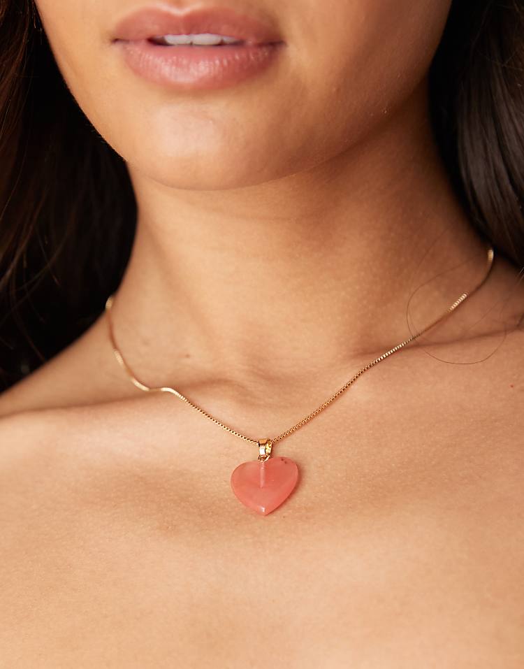 https://images.asos-media.com/products/asos-design-necklace-with-pink-semi-precious-quartz-heart-pendant-in-gold-tone/208395871-1-pink?$n_750w$&wid=750&fit=constrain