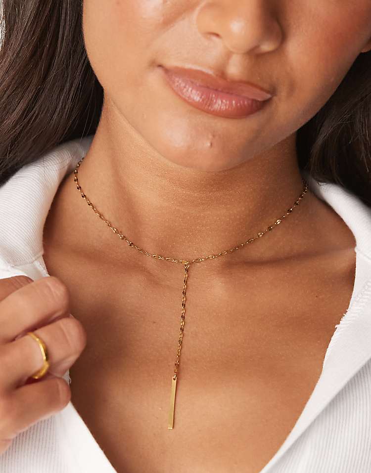 https://images.asos-media.com/products/lost-souls-simple-lariat-necklace-in-18ct-gold-plated-stainless-steel/208512626-1-gold?$n_750w$&wid=750&fit=constrain