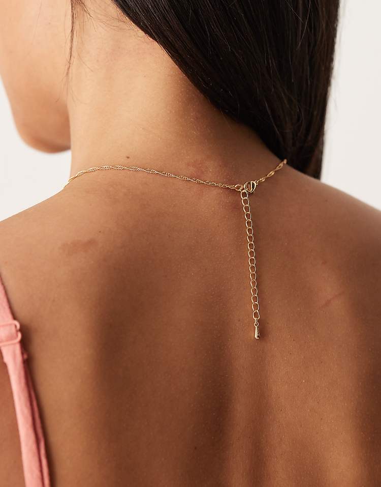 https://images.asos-media.com/products/designb-london-amber-stone-pendant-necklace-in-gold/208519283-2?$n_750w$&wid=750&fit=constrain