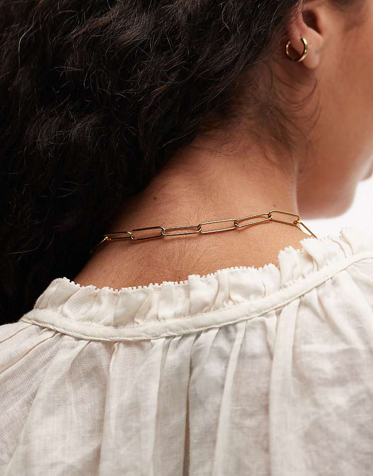 https://images.asos-media.com/products/topshop-sally-waterproof-stainless-steel-chunky-chain-necklace-with-charms-in-gold/208532389-3?$n_750w$&wid=750&fit=constrain