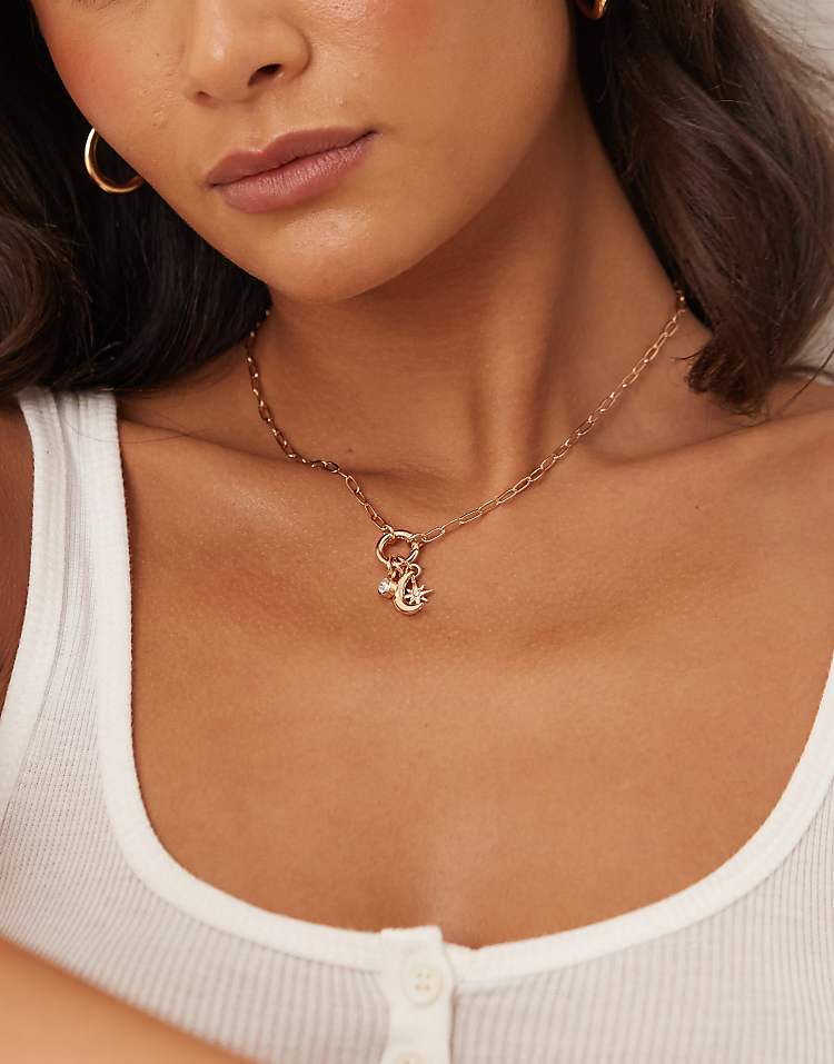 https://images.asos-media.com/products/asos-design-necklace-with-interchangeable-charms-details-in-gold-tone/208540292-1-gold?$n_750w$&wid=750&fit=constrain
