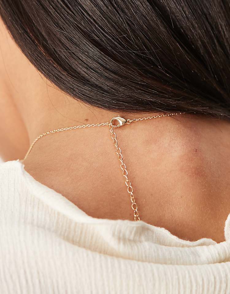 https://images.asos-media.com/products/asos-design-necklace-with-molten-pendant-in-gold-tone/208583096-3?$n_750w$&wid=750&fit=constrain
