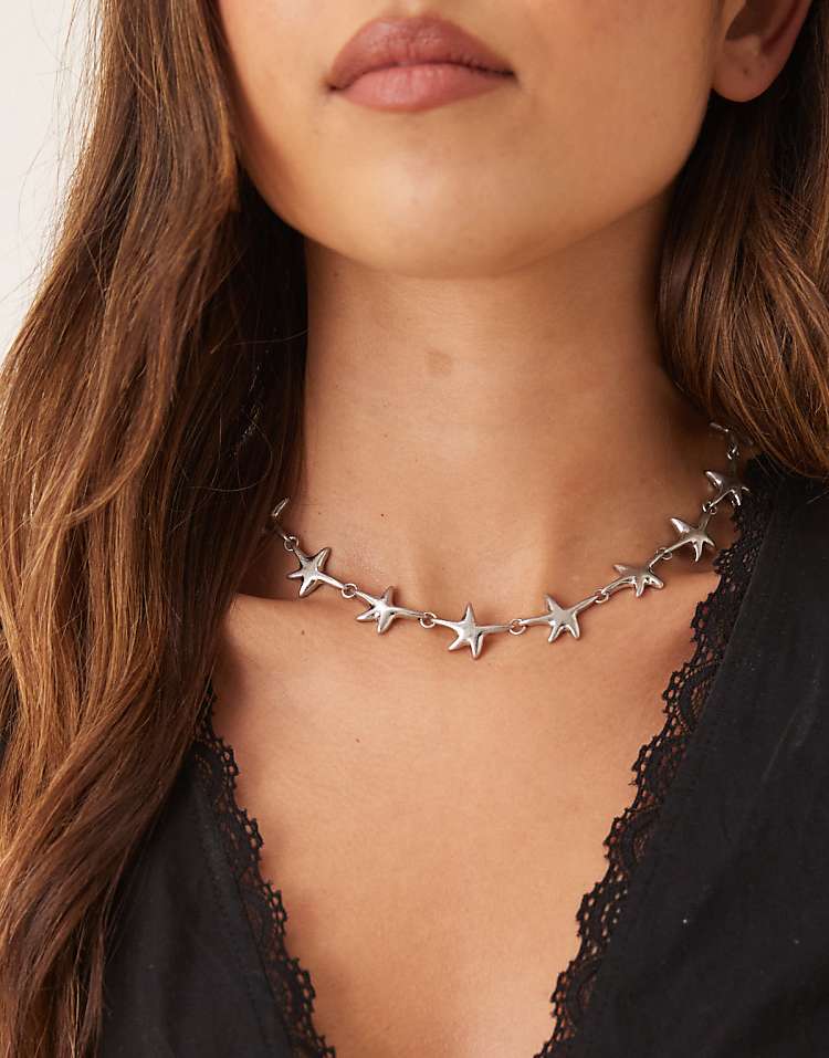 https://images.asos-media.com/products/asos-design-necklace-in-starfish-design-in-brushed-silver-tone/208789312-1-silver?$n_750w$&wid=750&fit=constrain