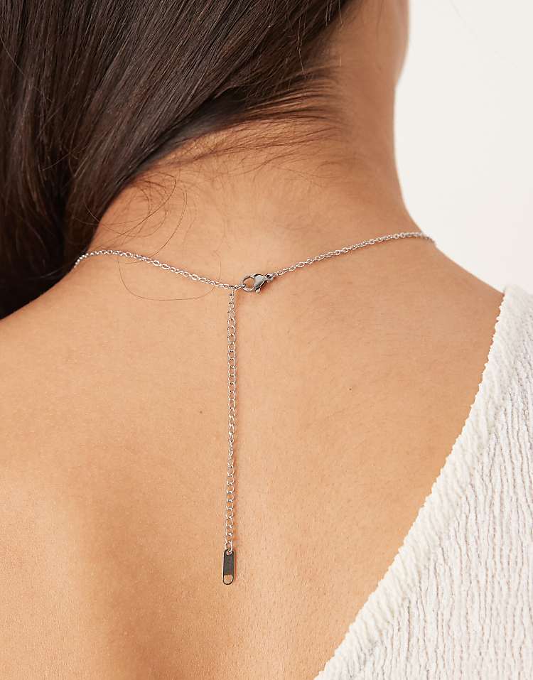 https://images.asos-media.com/products/lost-souls-stainless-steel-cutout-large-pendant-necklace-in-silver/208880237-3?$n_750w$&wid=750&fit=constrain