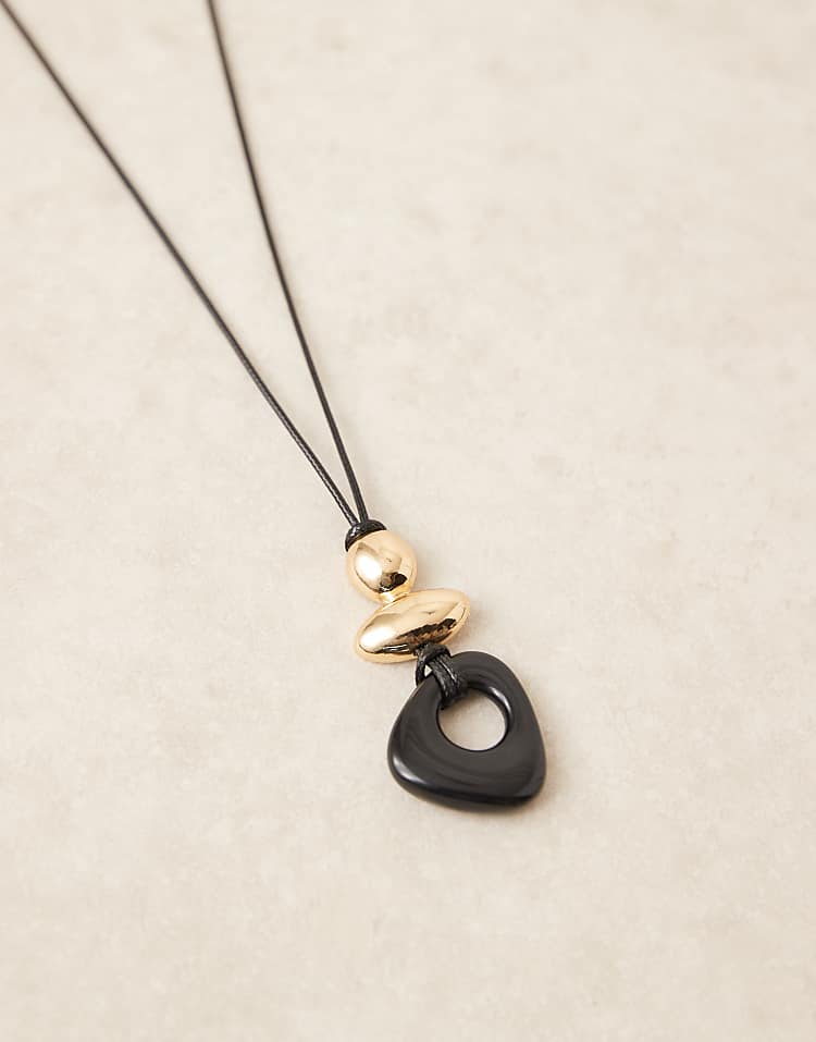 https://images.asos-media.com/products/designb-london-resin-pendant-cord-necklace-in-black-and-gold/208910708-2?$n_750w$&wid=750&fit=constrain