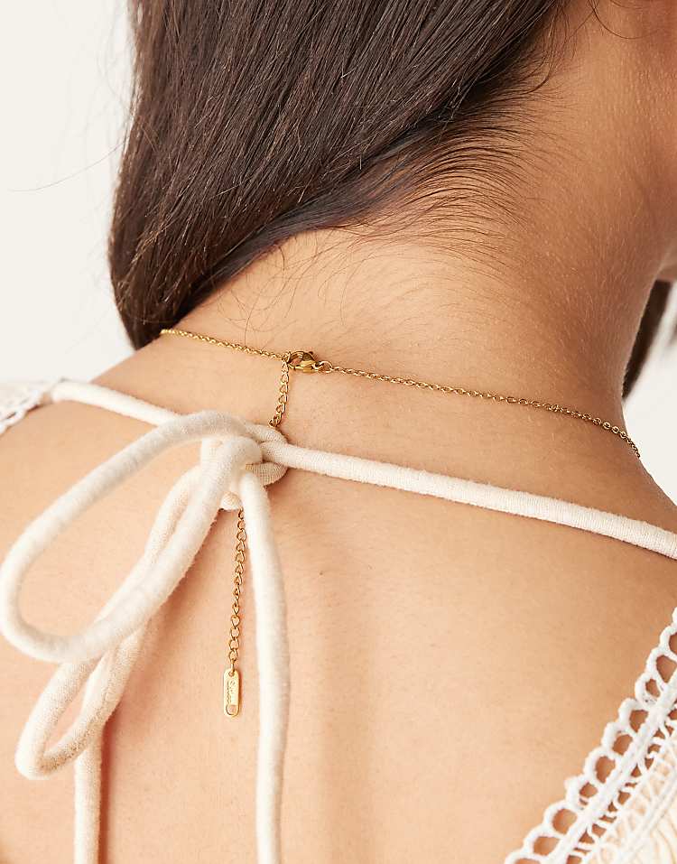https://images.asos-media.com/products/lost-souls-green-stone-necklace-in-18ct-gold-plated-stainless-steel/208992273-2?$n_750w$&wid=750&fit=constrain