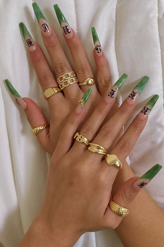 https://cdn.shopify.com/s/files/1/0293/9277/products/CroissantMultiRingSet-Gold_MER.jpg?v=1626992777