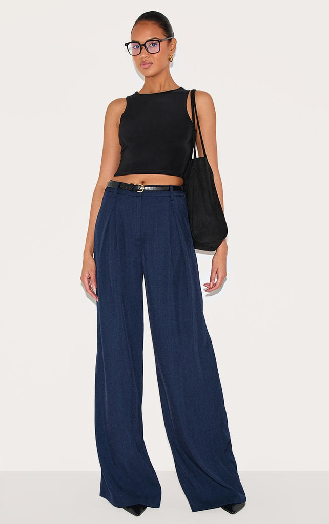 https://cdn-img.prettylittlething.com/d/7/5/3/d753d13c725f5f7f51fc83791c8e649a92ab4d43_CNG0442_3_black_slinky_racer_crop_top.jpg