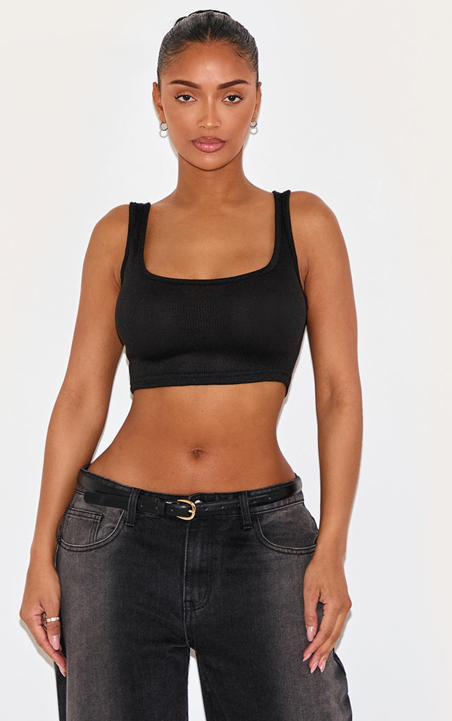 https://cdn-img.prettylittlething.com/f/f/a/2/ffa29166c4b16987ad3811ff47381804ad1b6e98_CMB0407_1_shape_black_ribbed_scoop_neck_crop_top.jpg